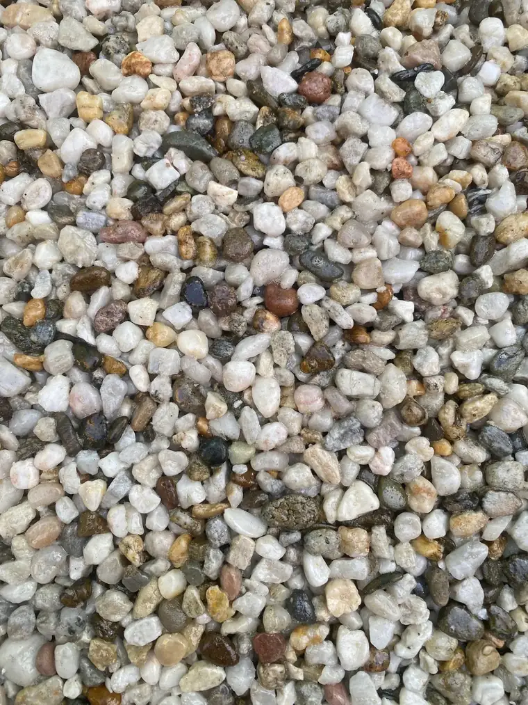 Natural Stone & Pebble Finishes for Beach Pools